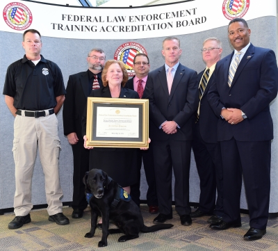 ATF staff accepts the certificate of accreditation.