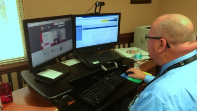 Dr. Gary Mitchell reviews assignments in the Assessor Refresher Online Training Program