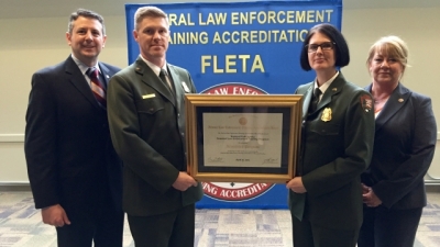 Members from the National Park Service receive their certificate of reaccreditation