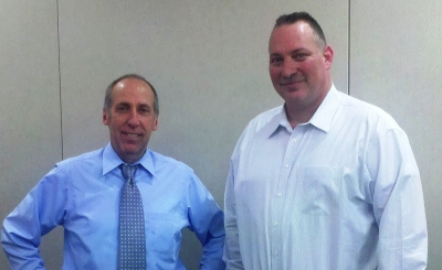 Jim Kirkpatrick, PhD (left) and FLETA Program Manager Billy McLeod (right) discuss return on expectations to the Training Officer's Consortium.