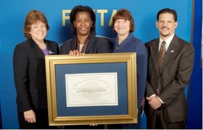 The award was presented to: Julia Pierson, Renee Triplett, Dr. Mary Kay Armour and Andy Bettencourt (not pictured were Kathy Wilson, Kim Canitz & LaNettae Scott)